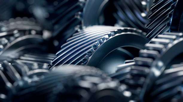 Close-up of metal gears, part of a fishing reel mechanism.